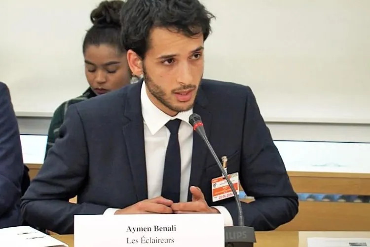 Aymen Benali speaking in Geneva